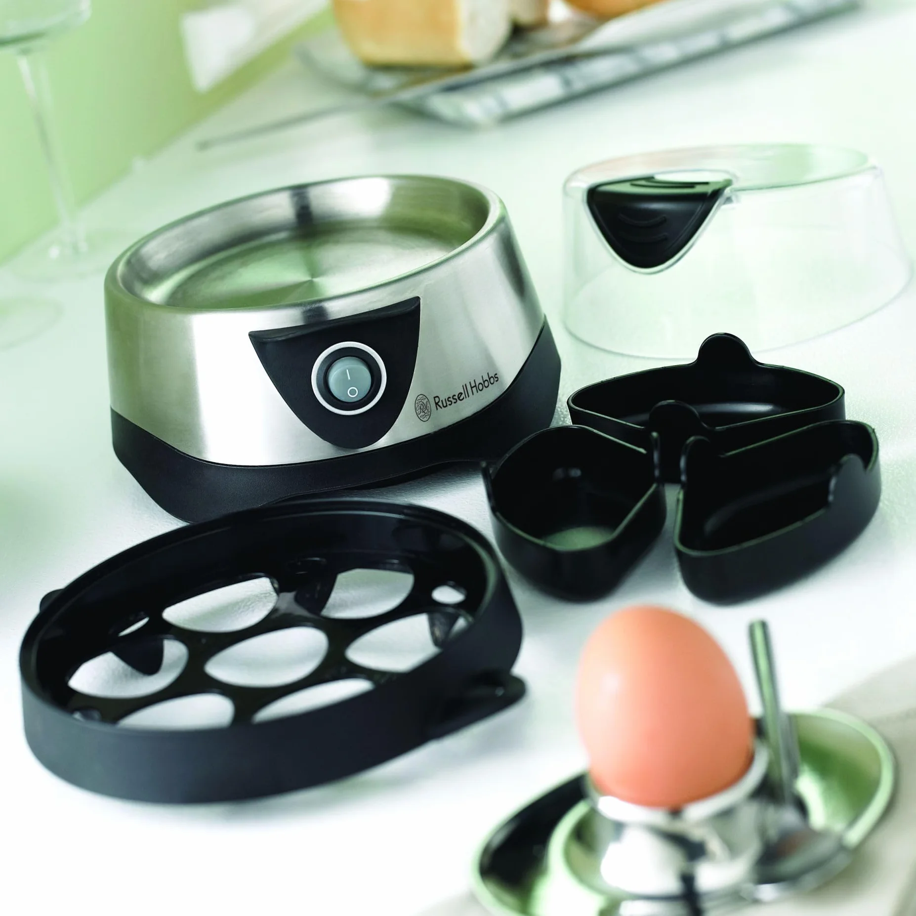Russell Hobbs Cocedor de Huevos Cook@Home - Capacidad para Hervir 7 Huevos y Pochar 3 Huevos, Apagado Automático, Incluye Recipiente Medidor, Tapa Plástico, Acero Inoxidable - 14048-56
